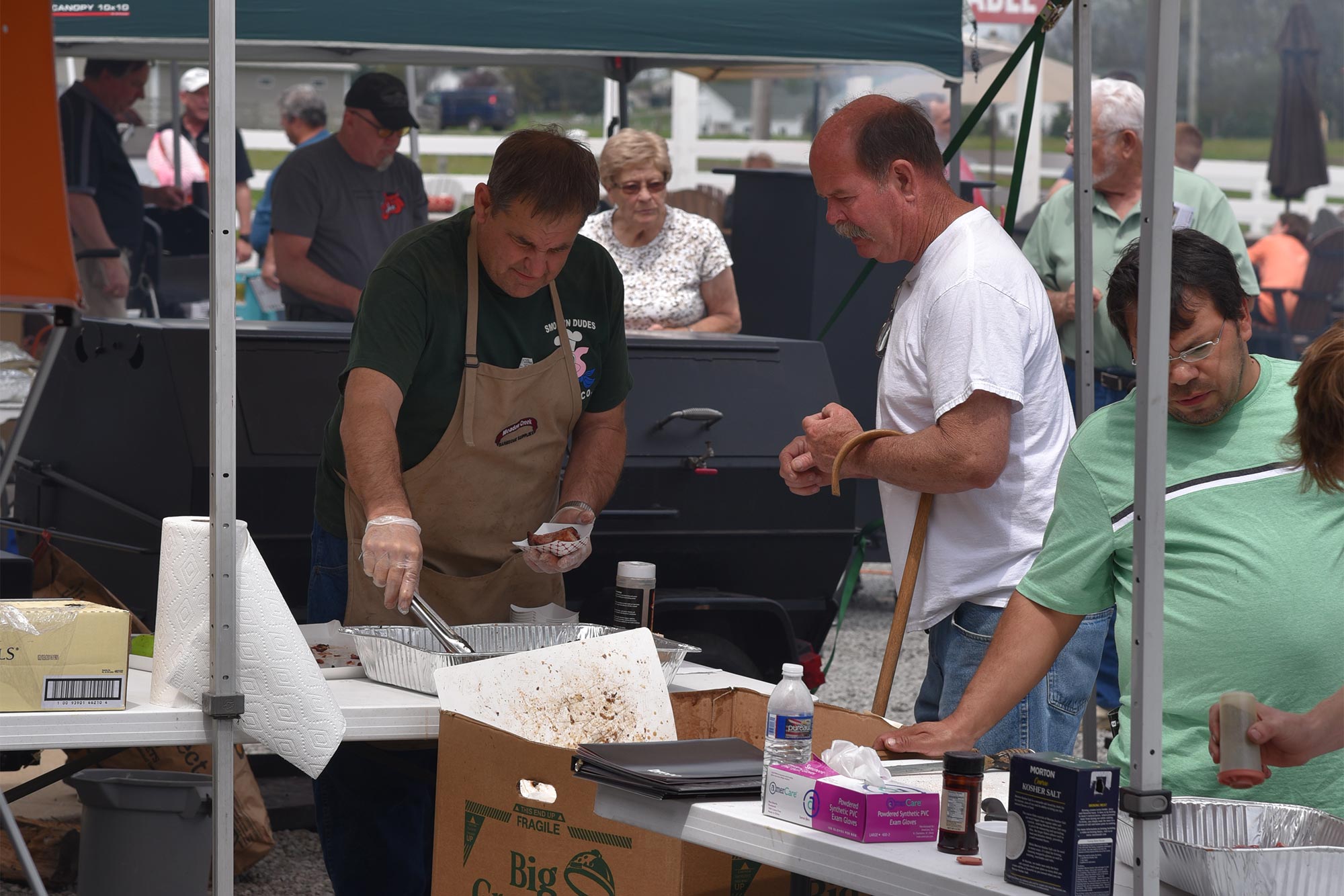 Serving BBQ Samples off the Meadow Creek Pig Roaster