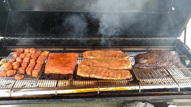 Wagyu Brisket, Pork Belly, Ribs, and Tasty Appetizers on Meadow Creek PR72T Pig Roaster Trailer