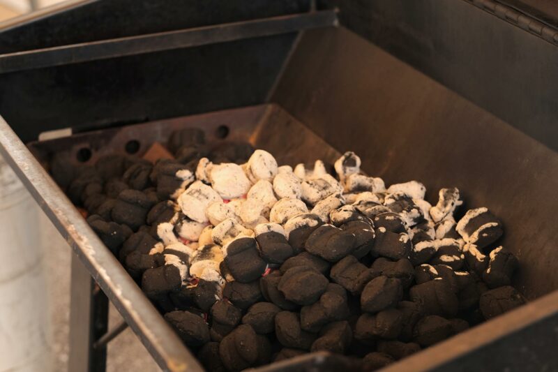 Firing Charcoal on a Meadow Creek Pig Roaster