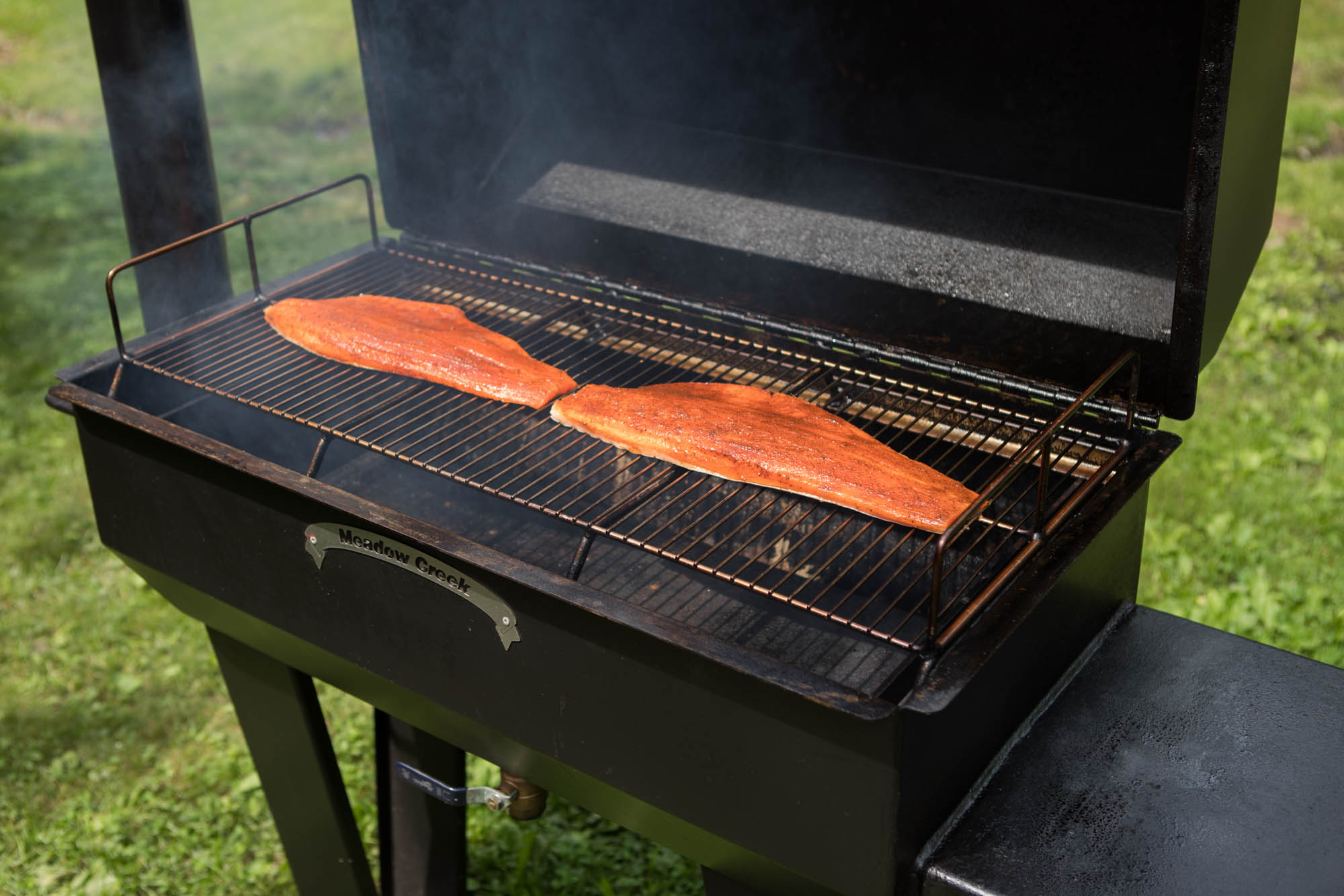 Smoking Steelhead on Meadow Creek SQ36 Offset Smoker