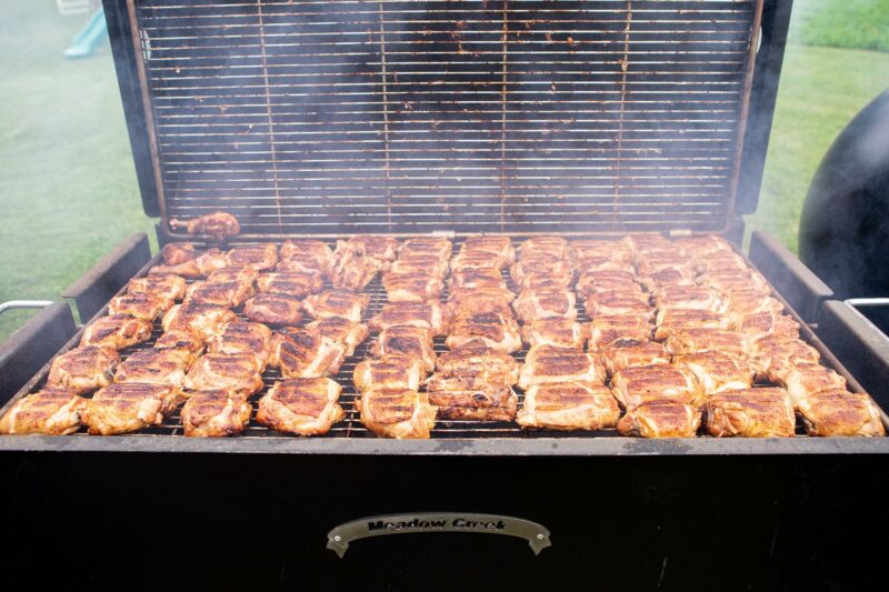 Grilled Chicken Thighs on Meadow Creek BBQ42 Chicken Cooker