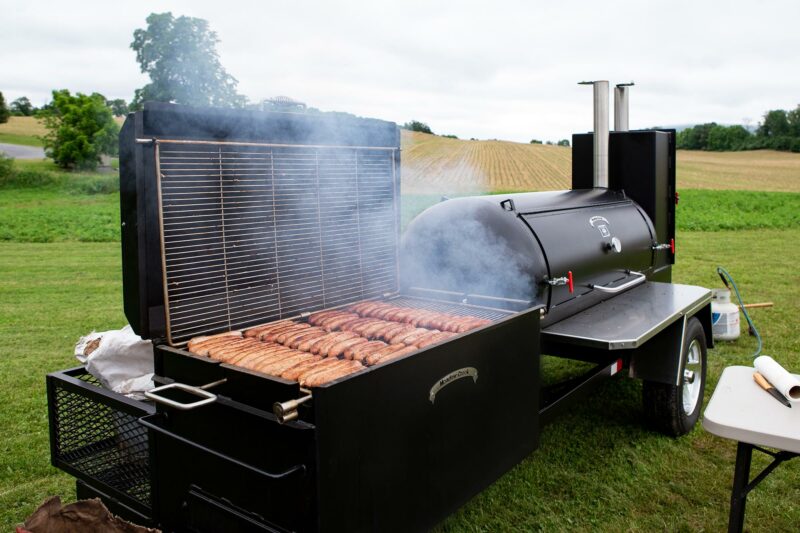 Sausages on Meadow Creek BBQ42 Chicken Smoker Grate