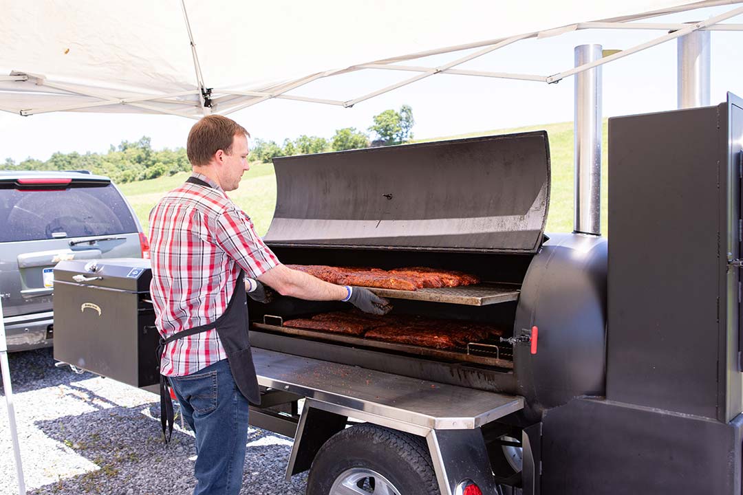 Smoking Ribs in BBQ Smoker on a Trailer